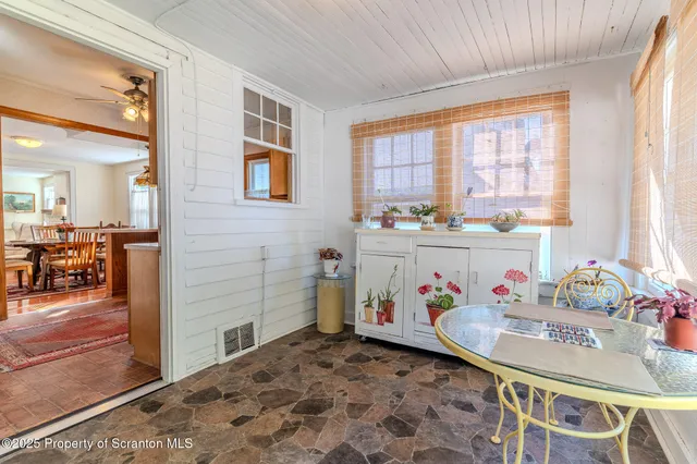 a view of a livingroom with furniture and window