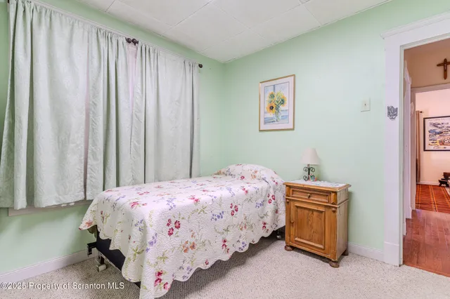 a bedroom with a bed and a cabinets