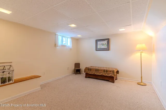 a view of a hallway with closet area