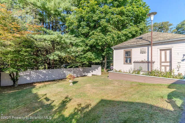 a view of a house with swimming pool