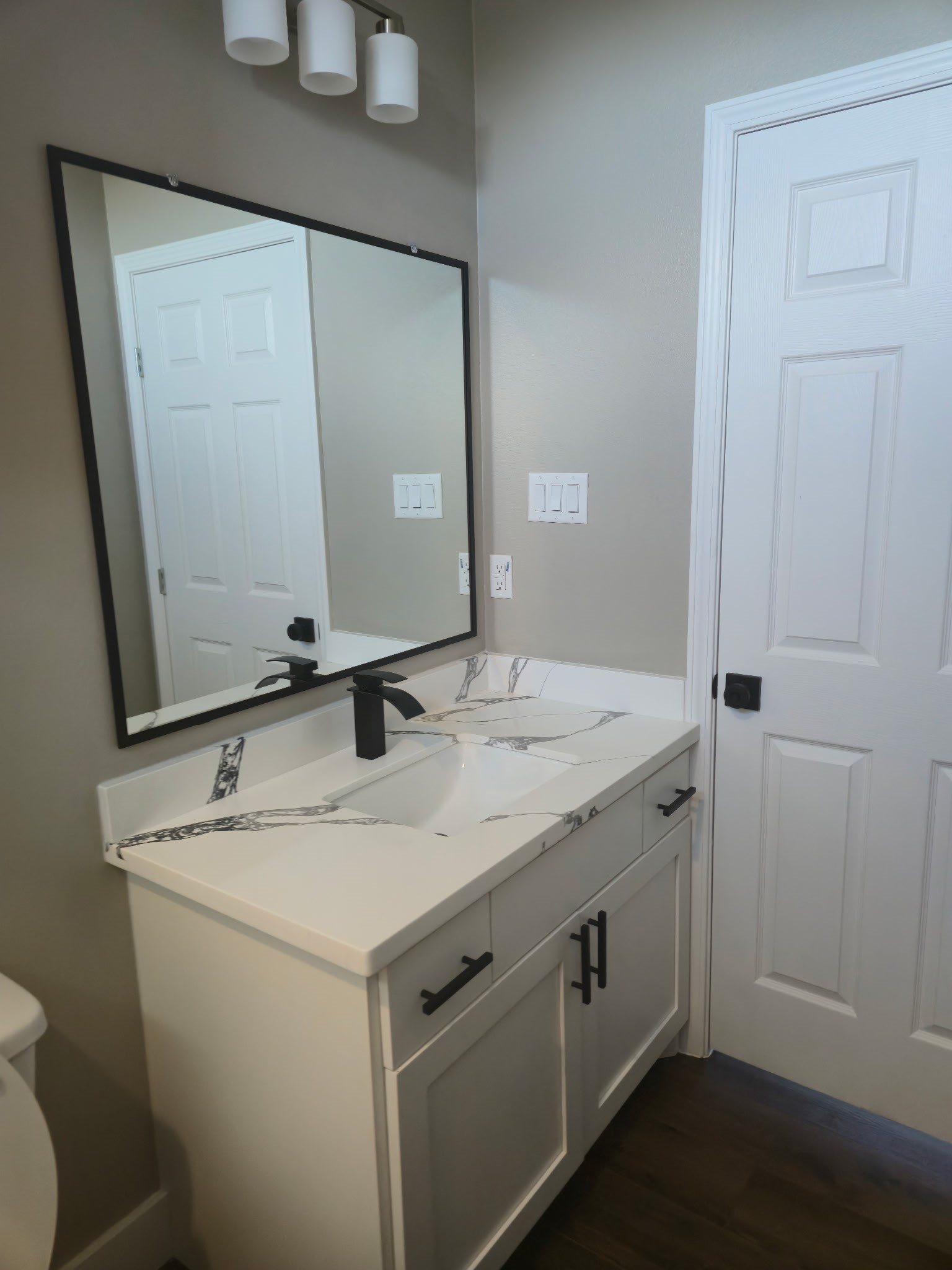 1226 9th Street San Leon, TX 77539 - Photo 18 of 32 a bathroom with a sink and mirror