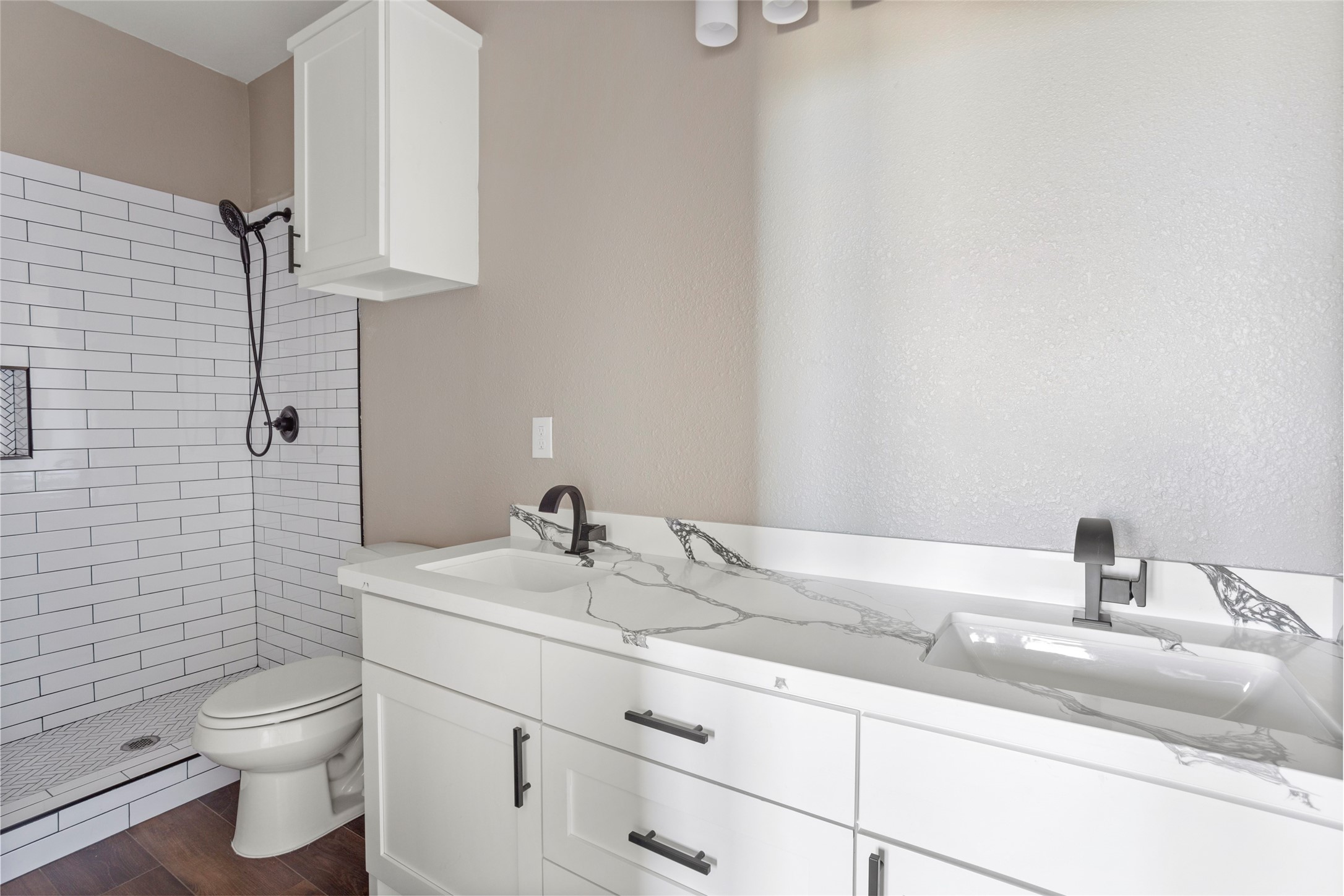 1226 9th Street San Leon, TX 77539 - Photo 19 of 32 a bathroom with a sink and a toilet