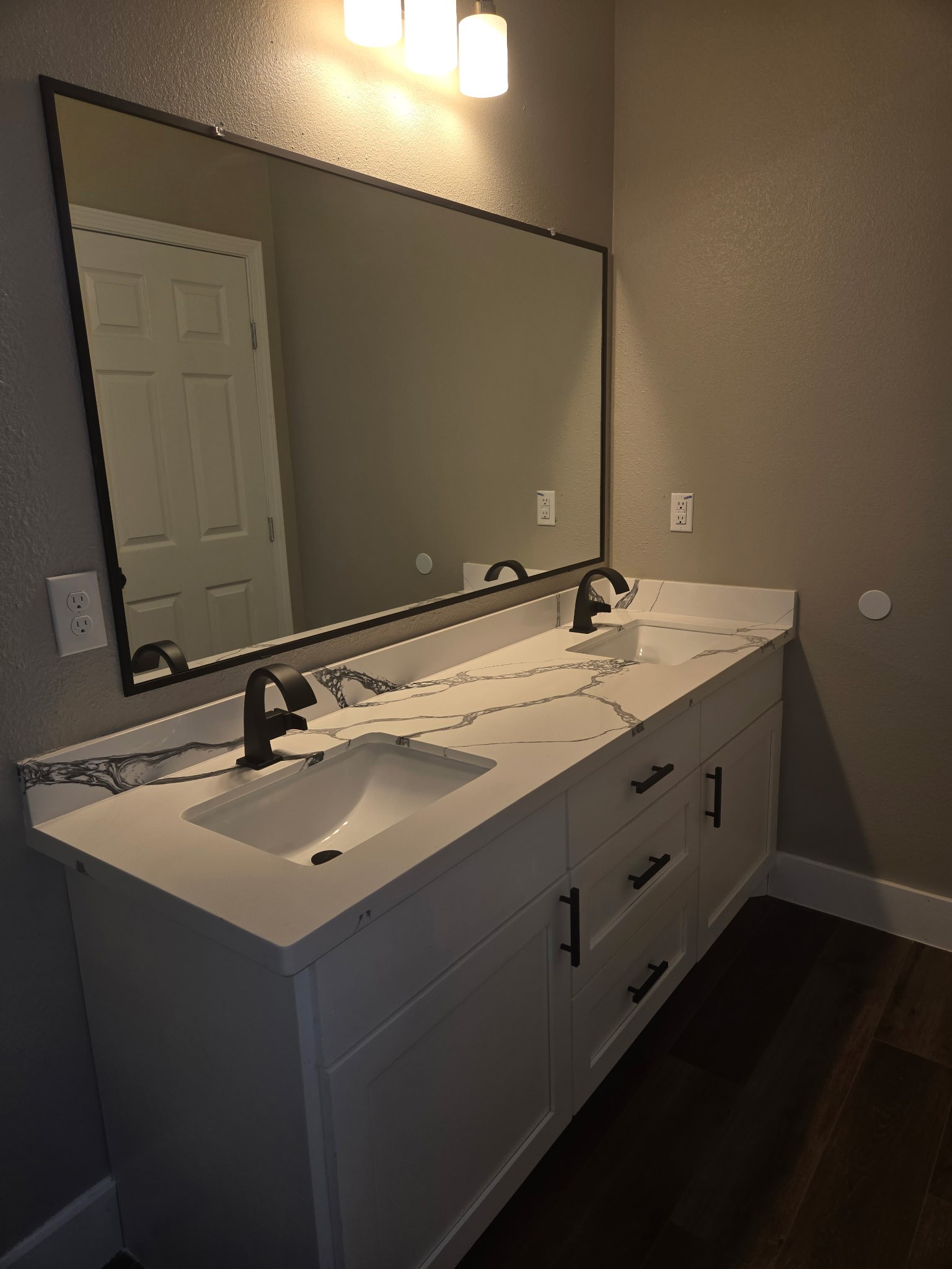 1226 9th Street San Leon, TX 77539 - Photo 20 of 32 a bathroom with a double vanity sink and a mirror