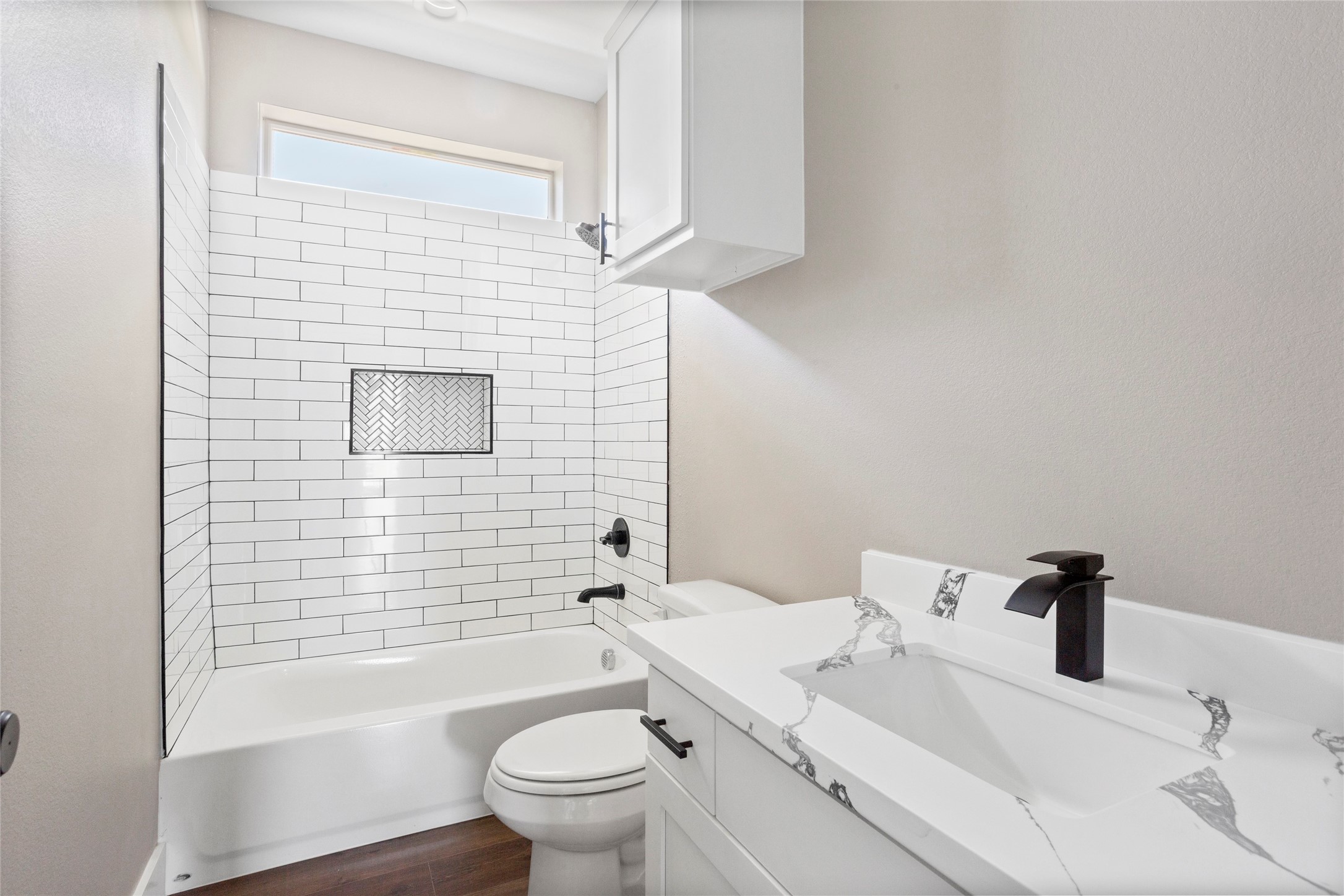 1226 9th Street San Leon, TX 77539 - Photo 25 of 32 a bathroom with a sink a toilet and shower