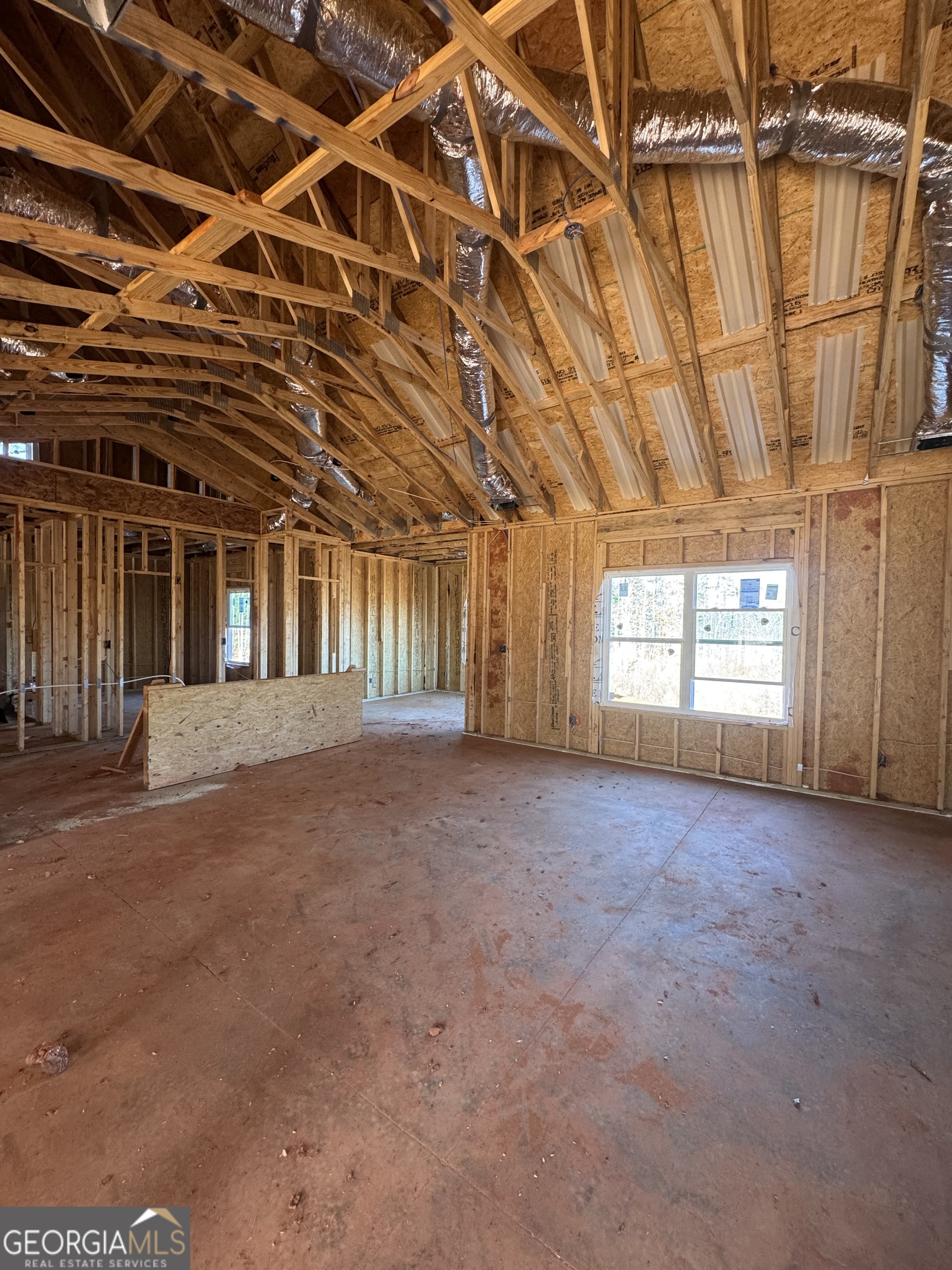 431 Andrews Mill Road Greenville, GA 30222 - Photo 4 of 8 a view of an empty room with a window