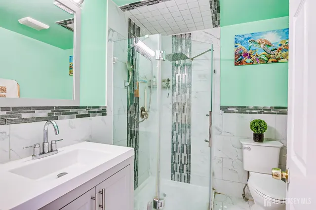 a view of a backyard with large trees