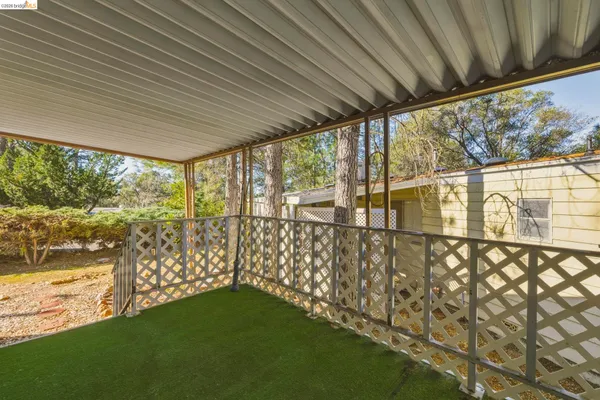a view of a back yard of the house
