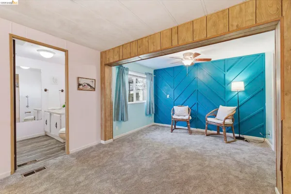 a view of a livingroom with furniture and window