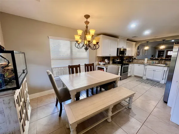 a view of a dining room with furniture