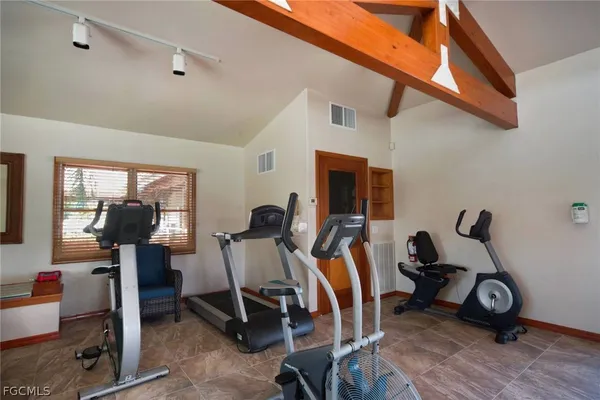a view of a room with gym equipment