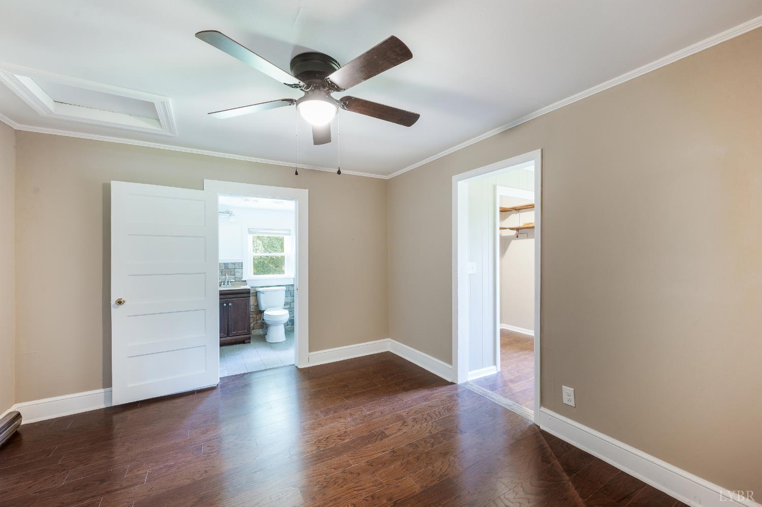 4550 Pumping Station Road Appomattox, VA 24522 - Photo 21 of 34 a view of an empty room with a window and wooden floor