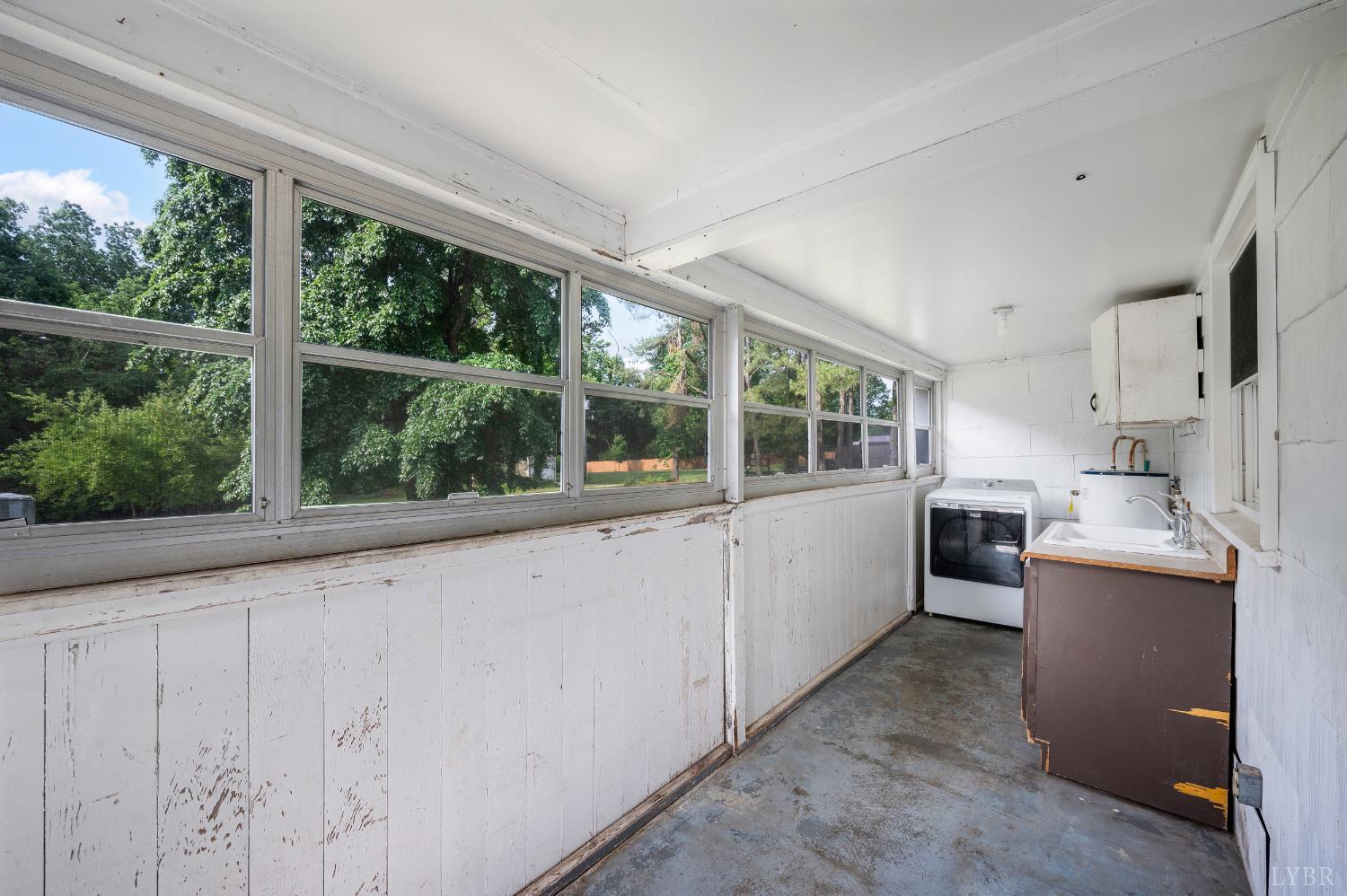 4550 Pumping Station Road Appomattox, VA 24522 - Photo 26 of 34 a large white kitchen with a large window