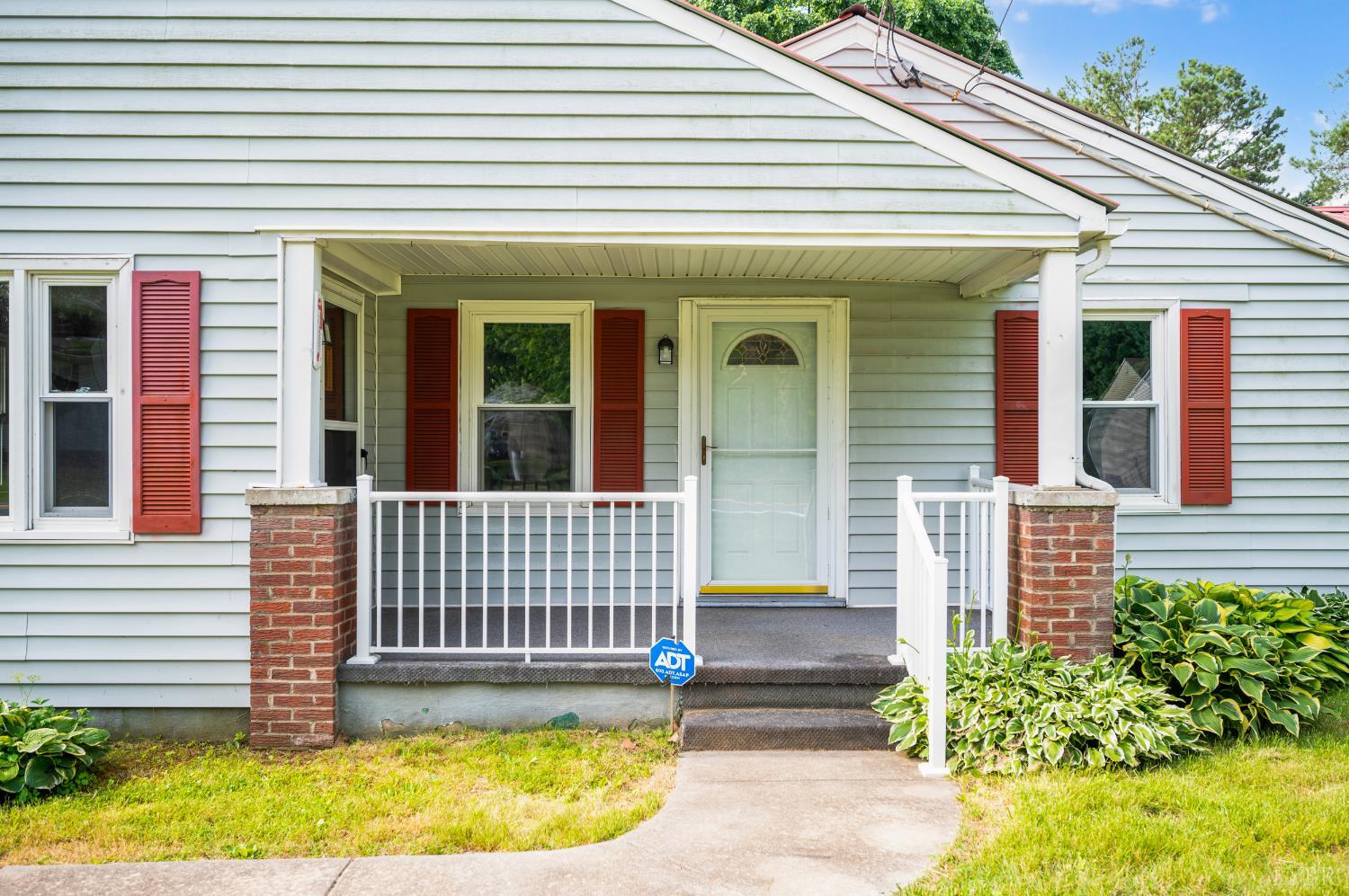 4550 Pumping Station Road Appomattox, VA 24522 - Photo 32 of 34 a view of a white house with many windows and plants