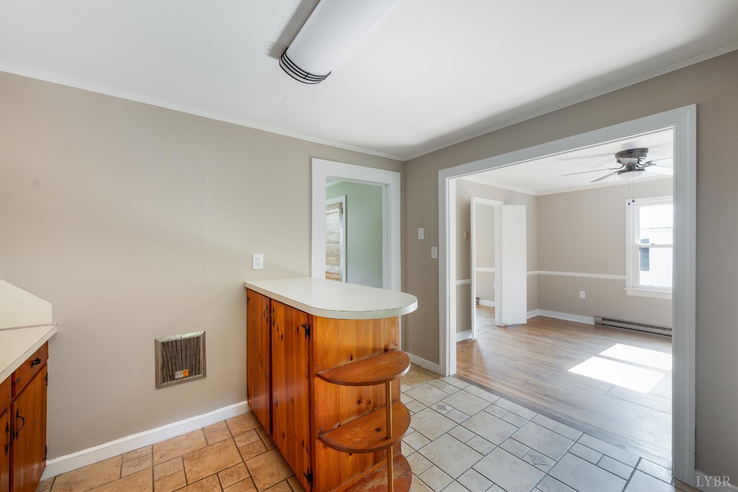 4550 Pumping Station Road Appomattox, VA 24522 - Photo 10 of 34 a view of a livingroom with furniture and a stove