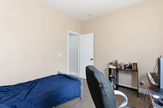 a workspace with furniture and wooden floor