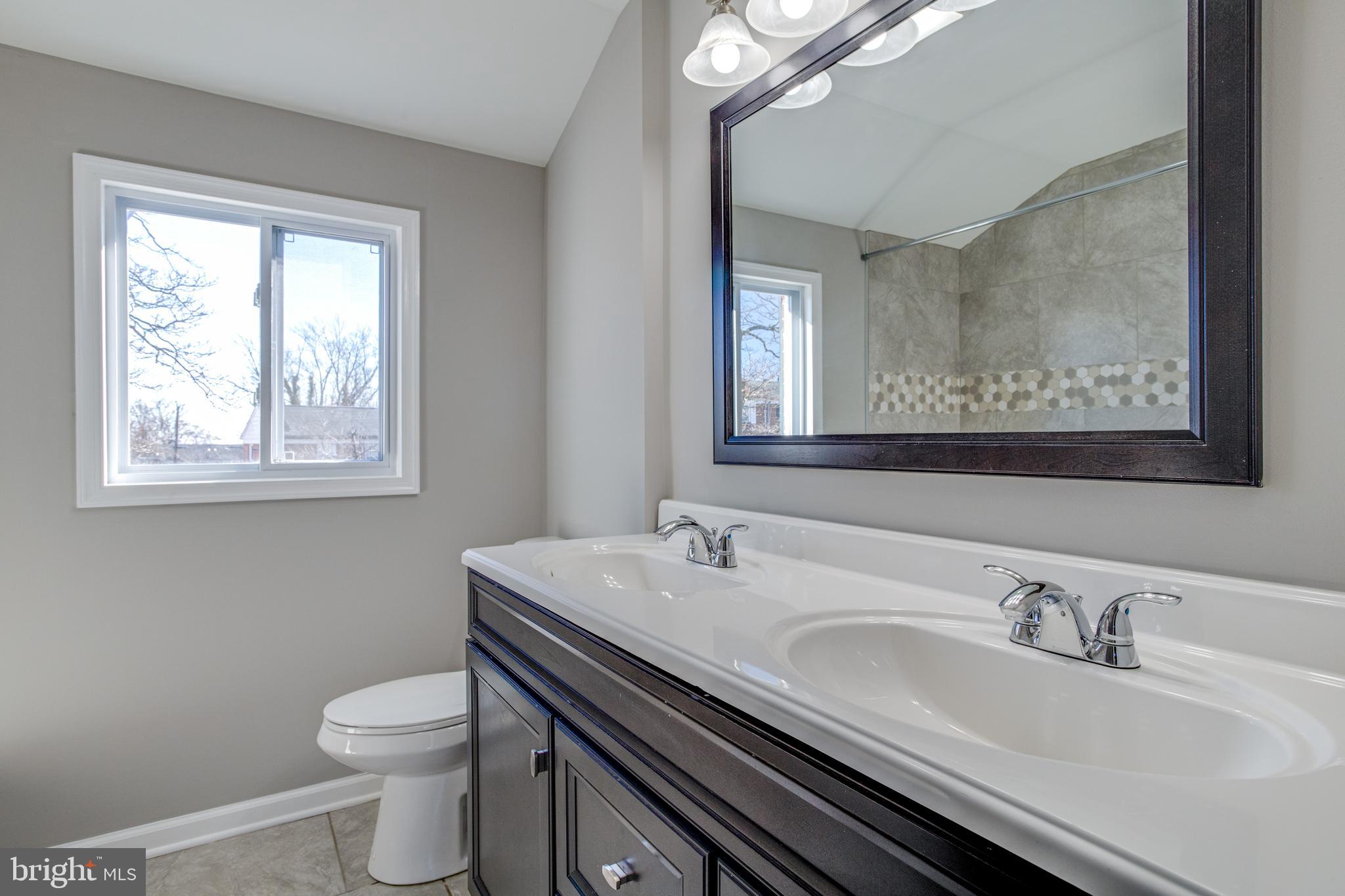 668 Queensgate Road Baltimore, MD 21229 - Photo 22 of 37 Full Bath with double vanity!