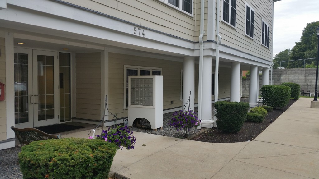 974 Main Street, Unit 25 Wakefield, MA 01880 - Photo 28 of 28 a front view of a house