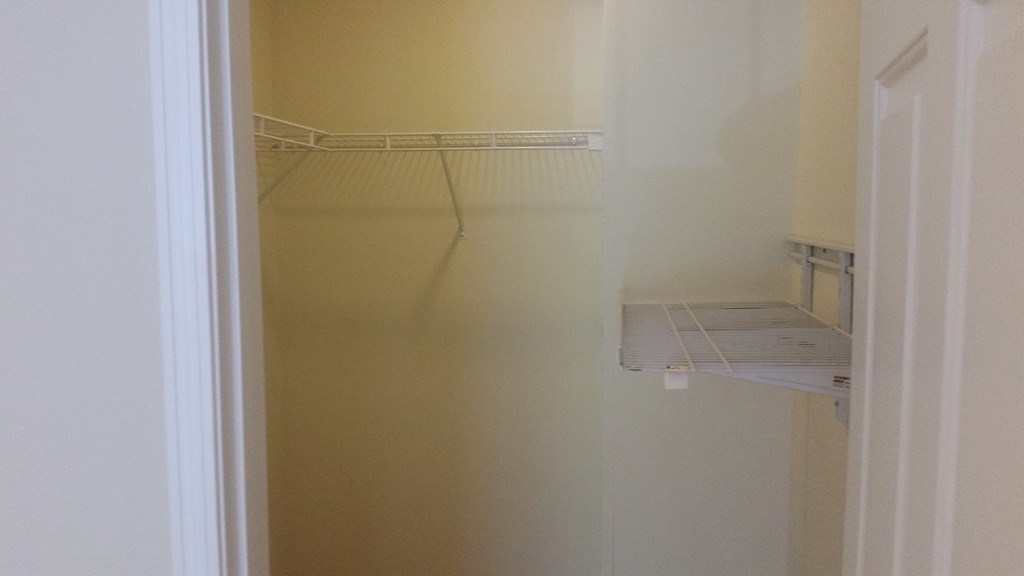 974 Main Street, Unit 25 Wakefield, MA 01880 - Photo 9 of 28 a bathroom with a glass shower door