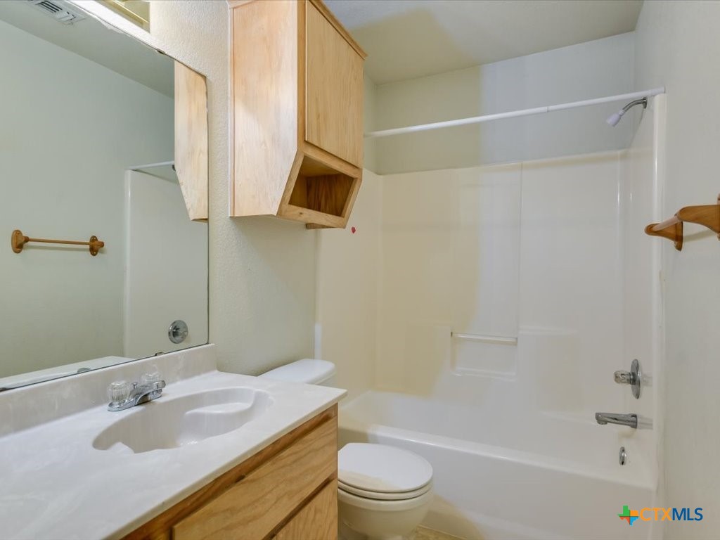 3805 El Paso Drive, Unit A Killeen, TX 76549 - Photo 16 of 20 a bathroom with a sink a toilet and shower