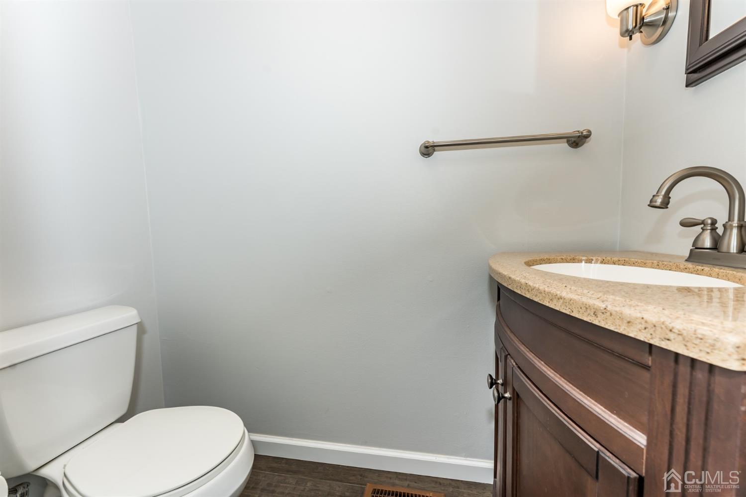 7 Brotherton Road Shamong, NJ 08088 - Photo 22 of 45 a bathroom with a granite countertop toilet and a sink