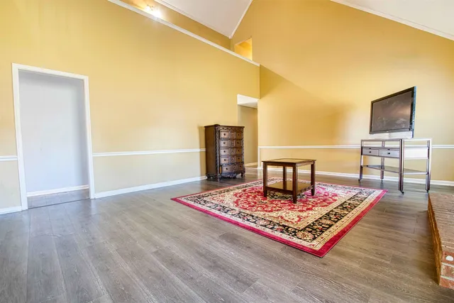 a living room with couch and a table