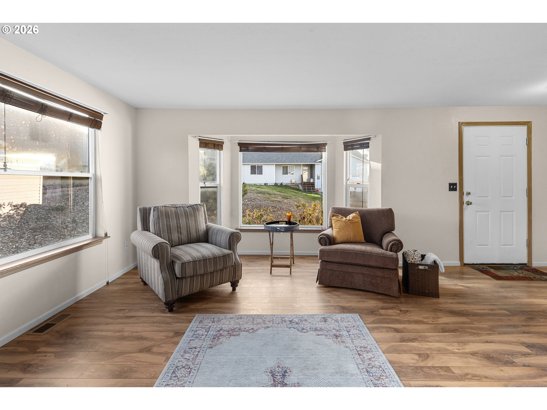 1314 Southwest 11th Court Pendleton, OR 97801 - Photo 11 of 30 a living room with furniture and a large window