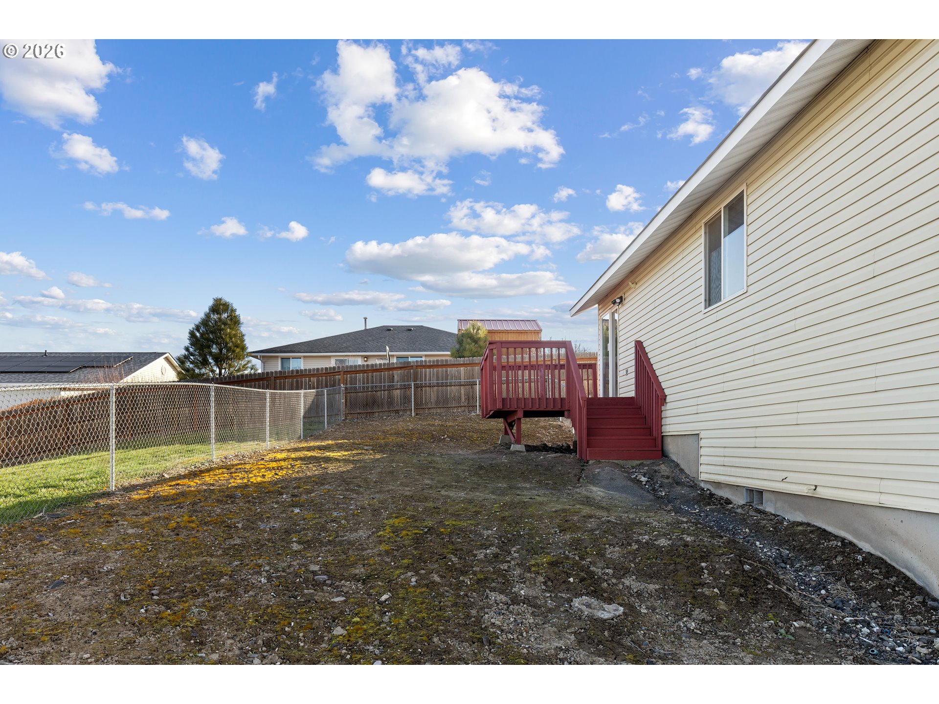 1314 Southwest 11th Court Pendleton, OR 97801 - Photo 25 of 30 a view of a backyard with sitting area