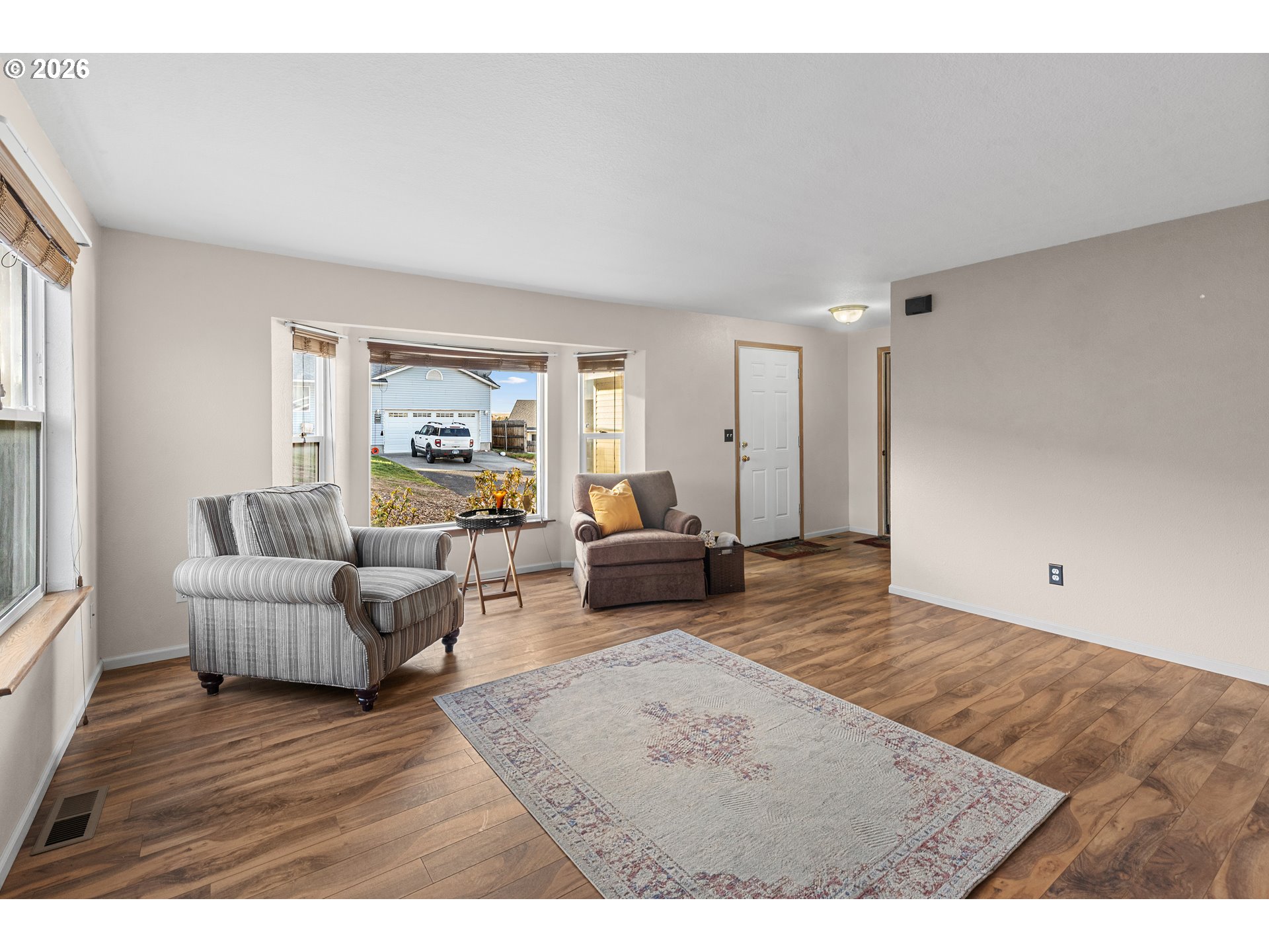 1314 Southwest 11th Court Pendleton, OR 97801 - Photo 10 of 30 a living room with furniture and a large window