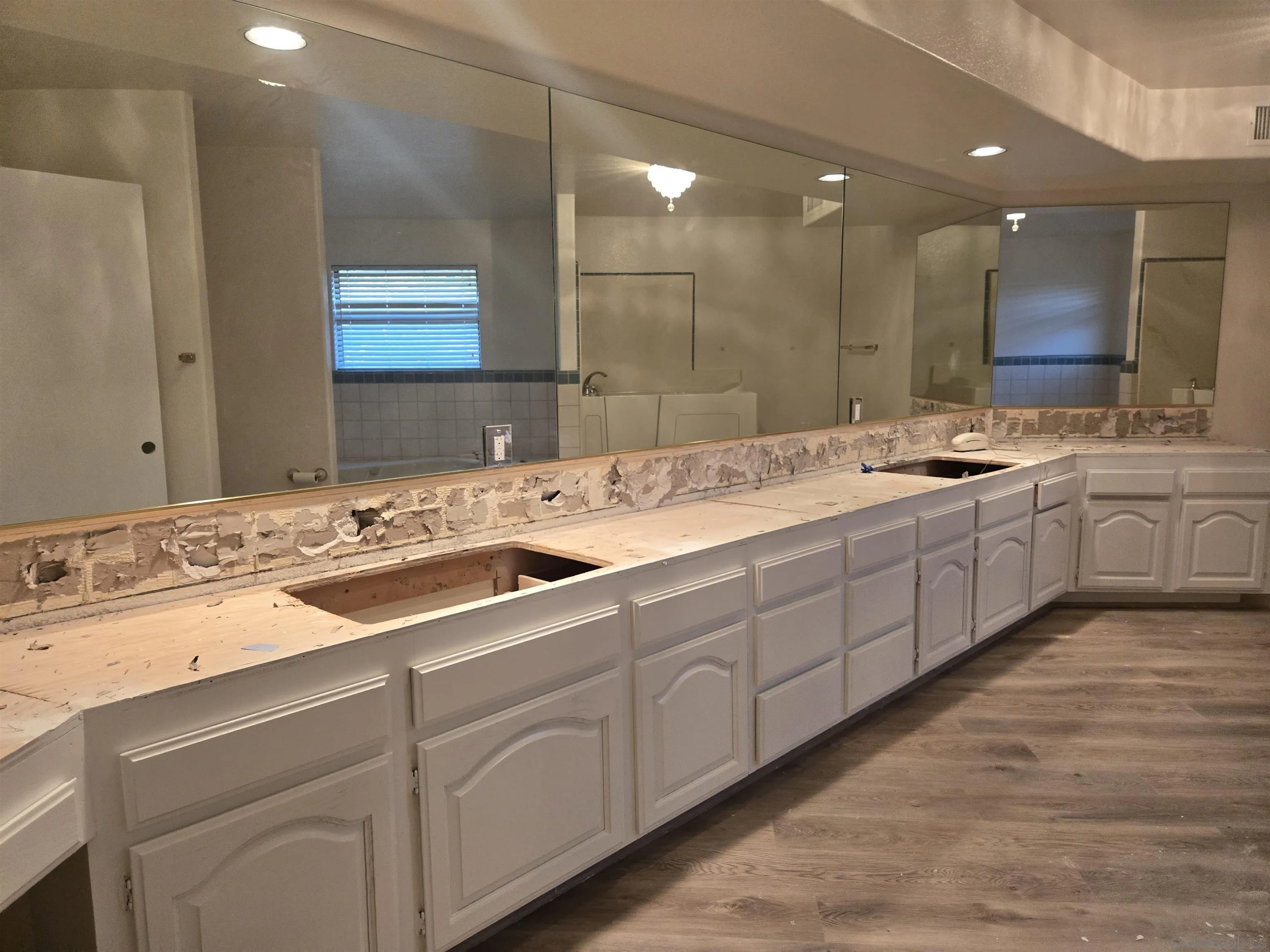 3725 Via Cielo Azul Alpine, CA 91901 - Photo 8 of 37 a bathroom with a sink and a mirror