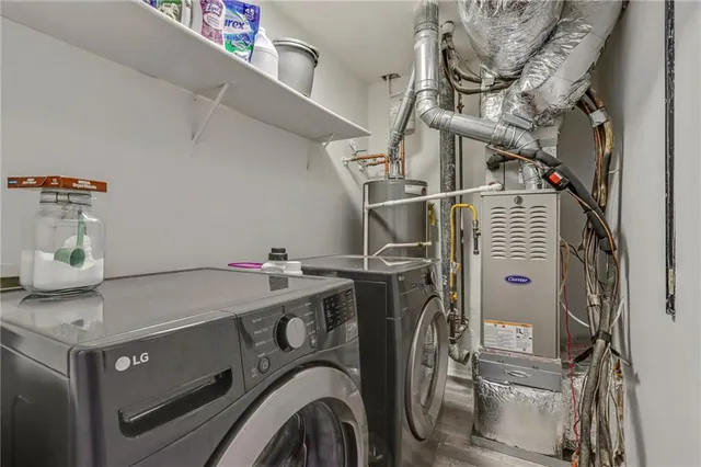 a utility room with dryer and washer