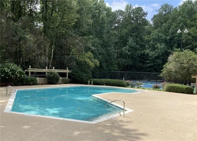 a view of a backyard with green space