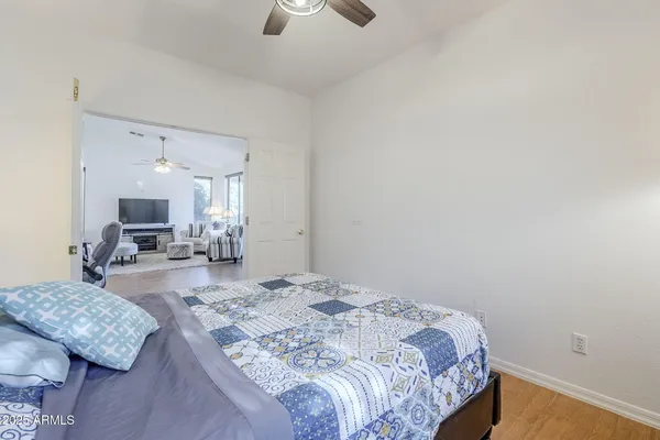 a bedroom with a bed and a dresser