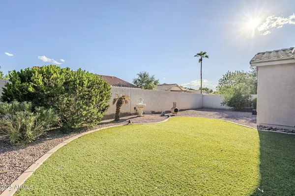 a view of a house with swimming pool and porch