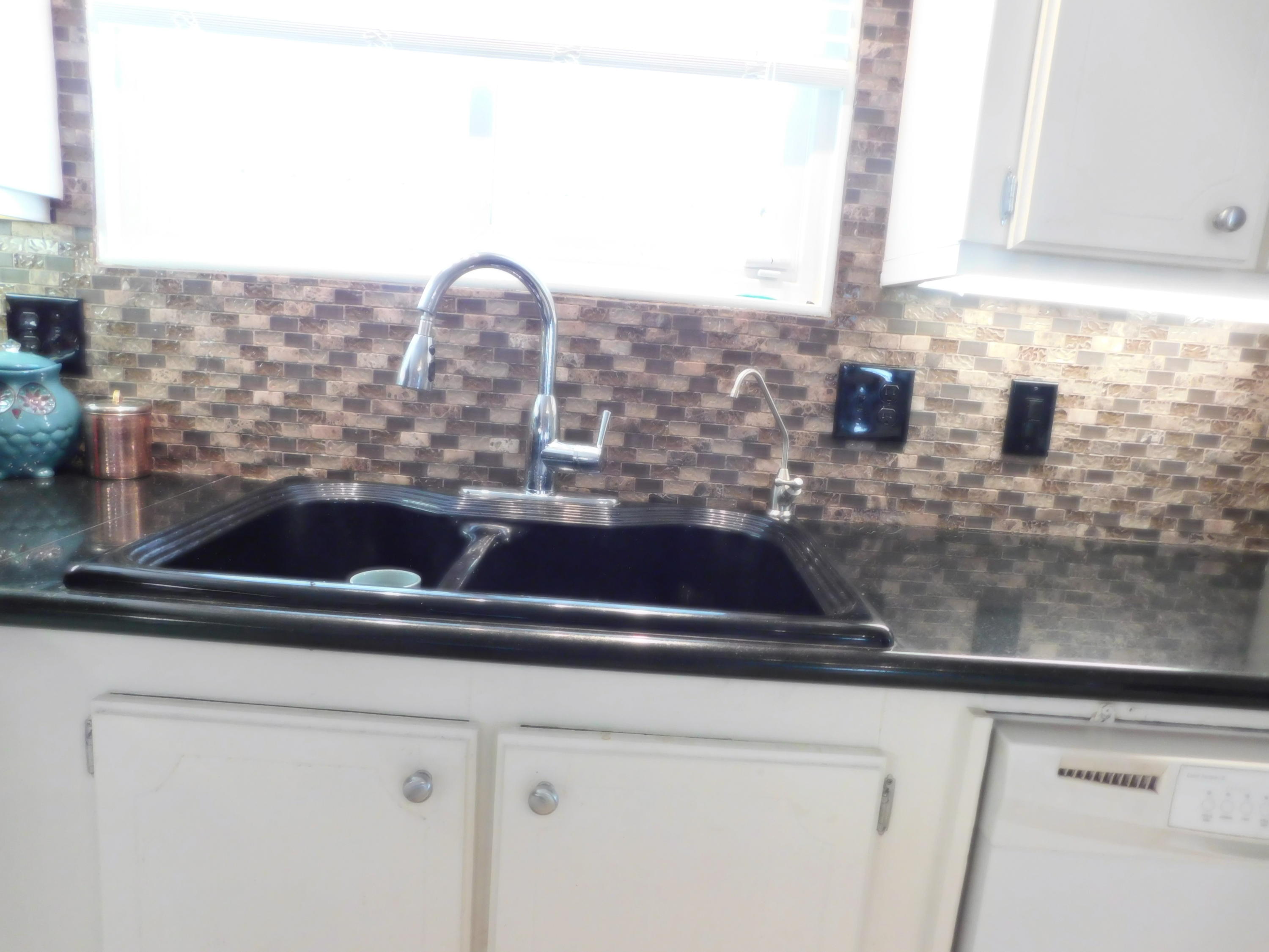 51555 Monroe Street, Unit 52 Indio, CA 92201 - Photo 11 of 42 a close view of sink and tap