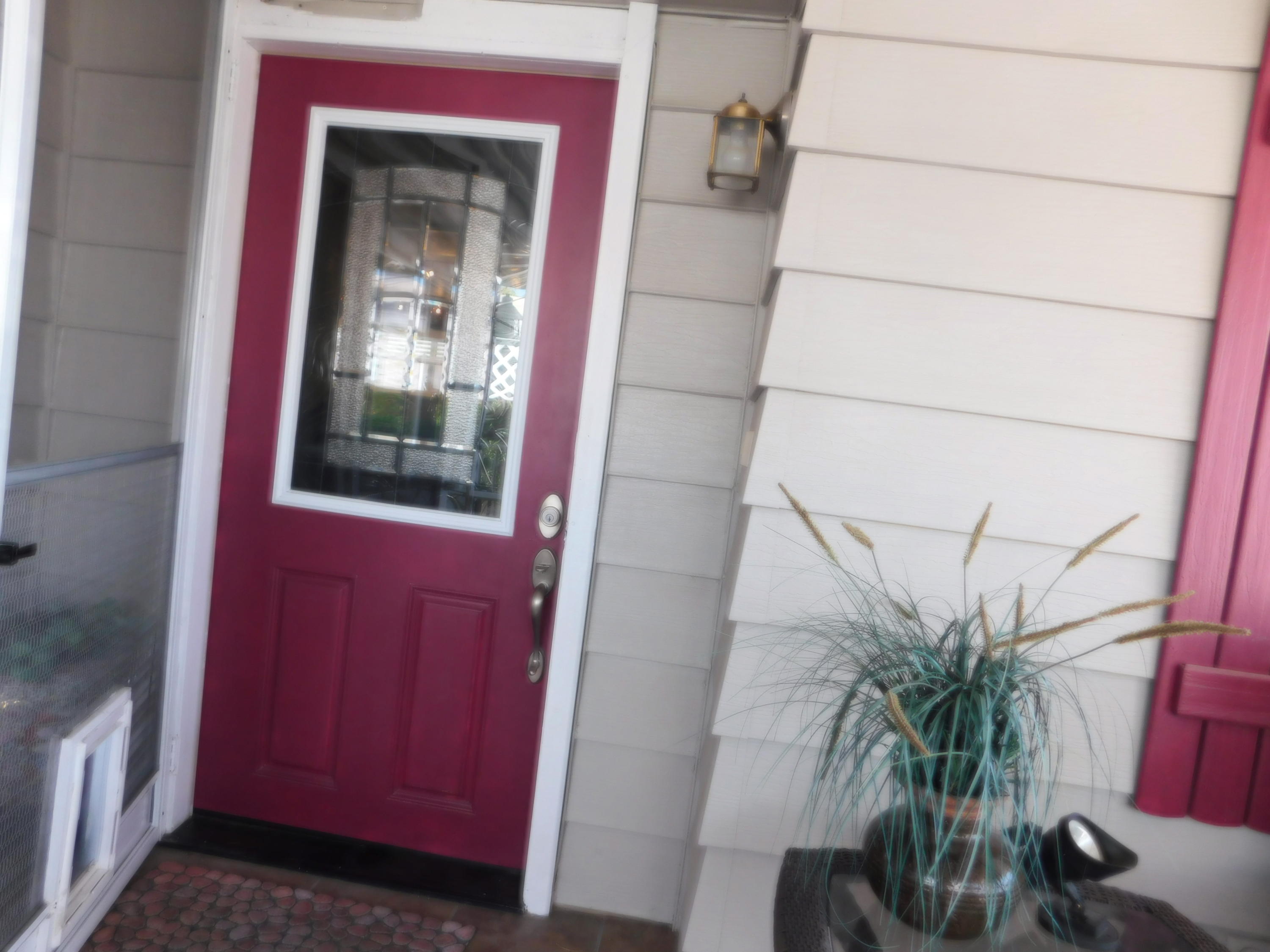 51555 Monroe Street, Unit 52 Indio, CA 92201 - Photo 26 of 42 a potted plant in front of a door