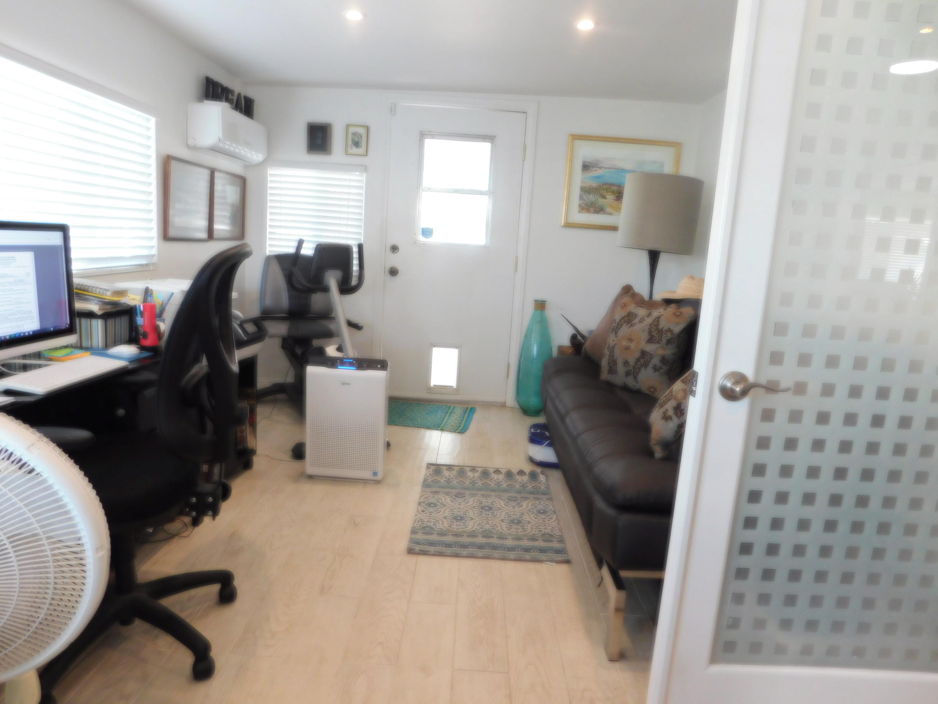 51555 Monroe Street, Unit 52 Indio, CA 92201 - Photo 34 of 42 a living room with furniture rug and a window