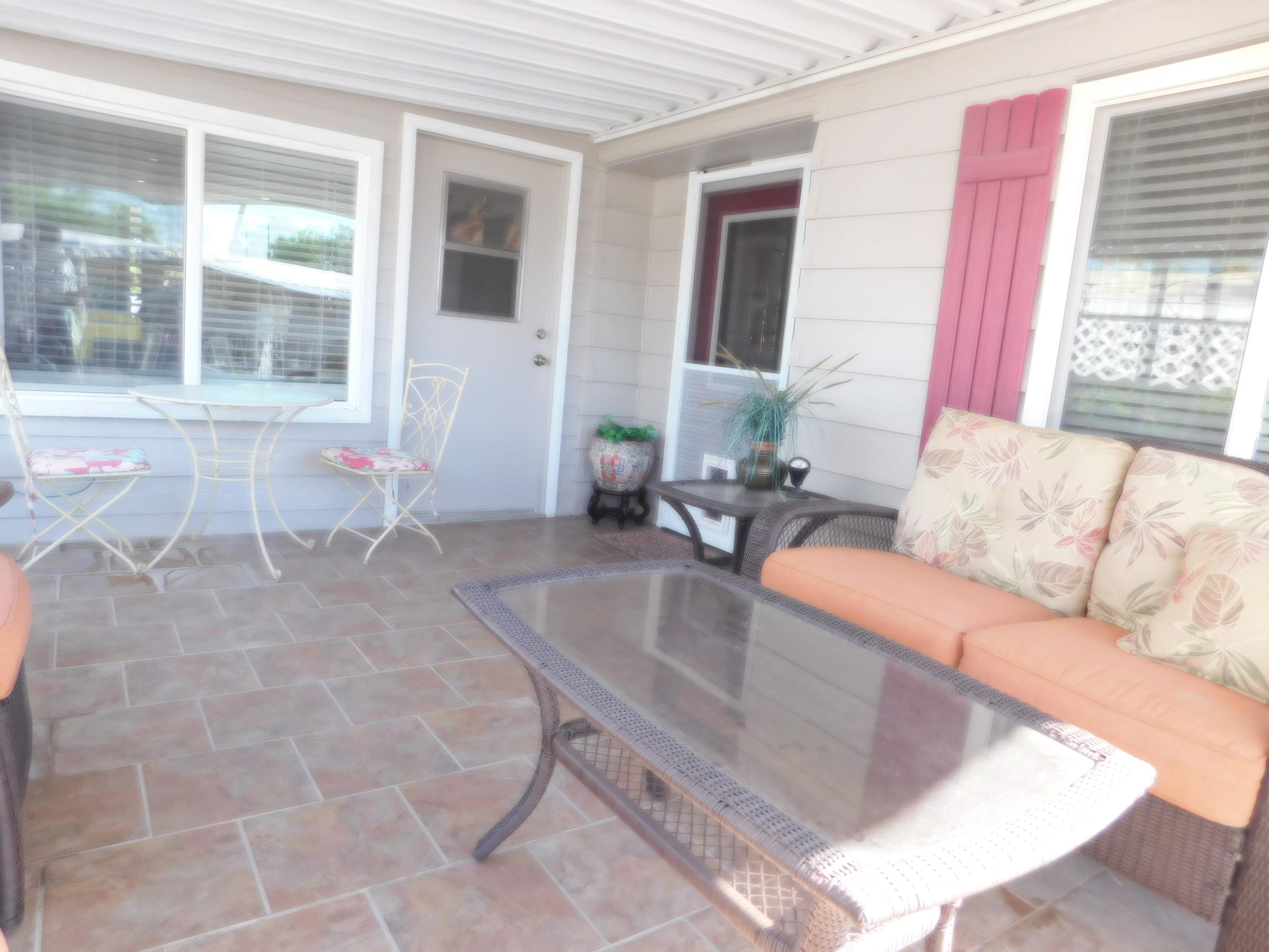 51555 Monroe Street, Unit 52 Indio, CA 92201 - Photo 36 of 42 a living room with furniture and large window