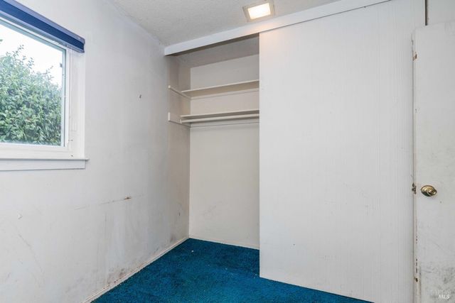 a view of front door with wooden floor