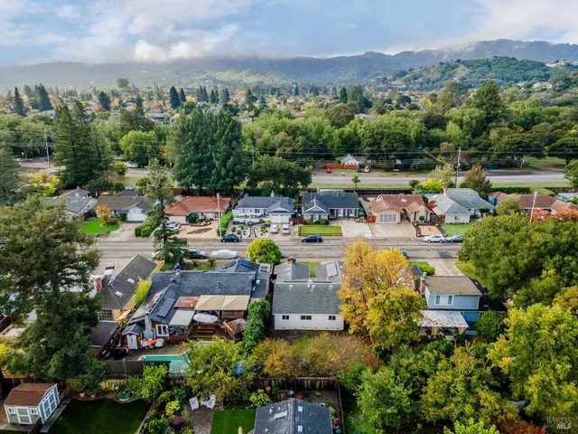 an aerial view of a house with a garden