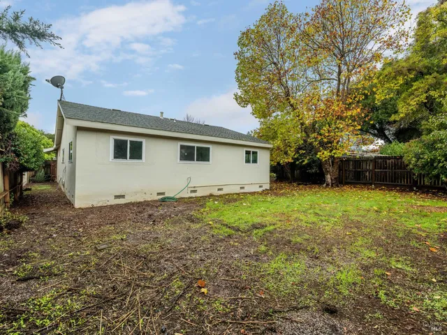 a view of a house with a garden