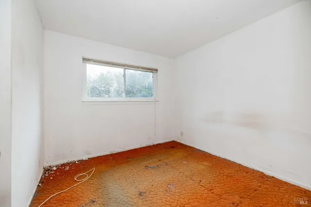 an empty room with a window