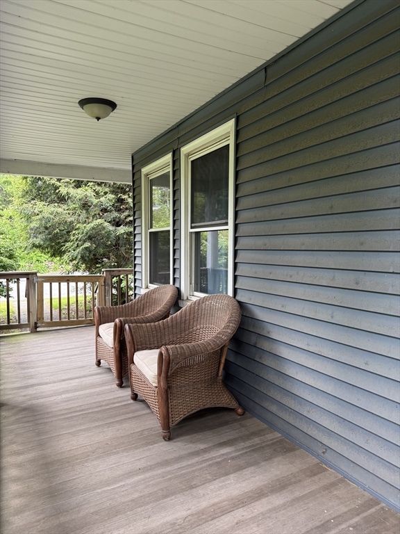 920 Worcester Road Barre, MA 01005 - Photo 16 of 40 a balcony with furniture and window