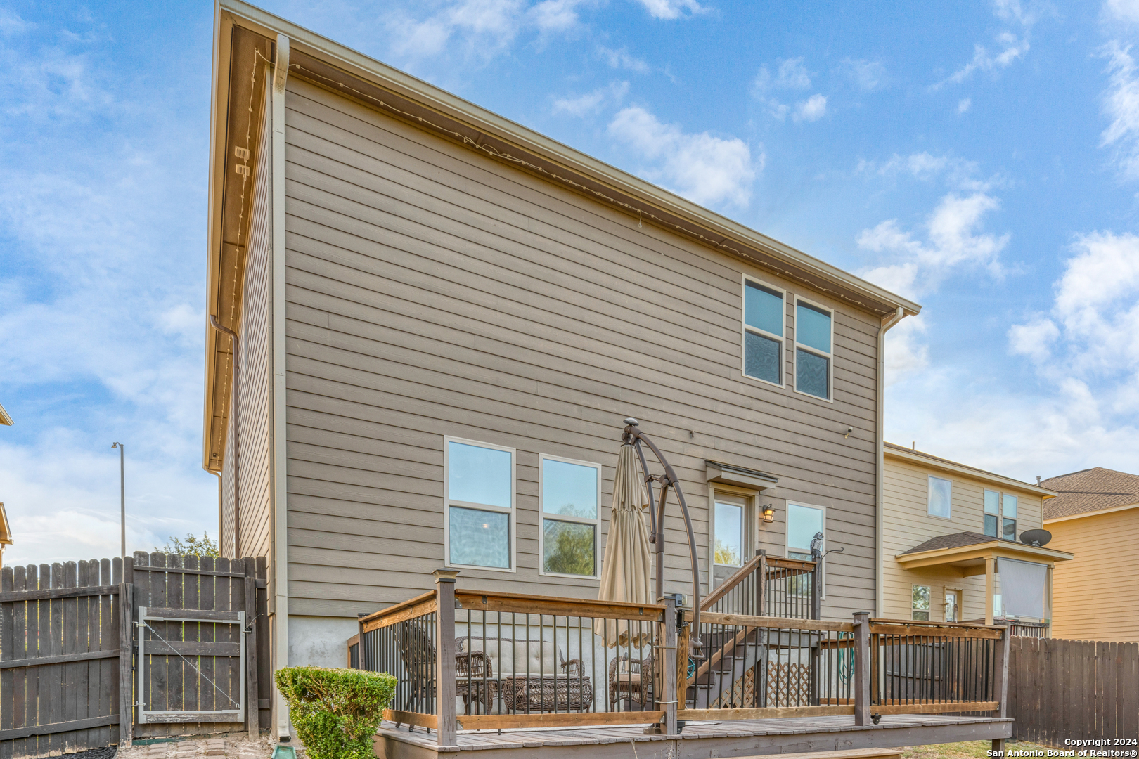 511 Fort Apache San Antonio, TX 78245 - Photo 30 of 32 a view of a house with a backyard