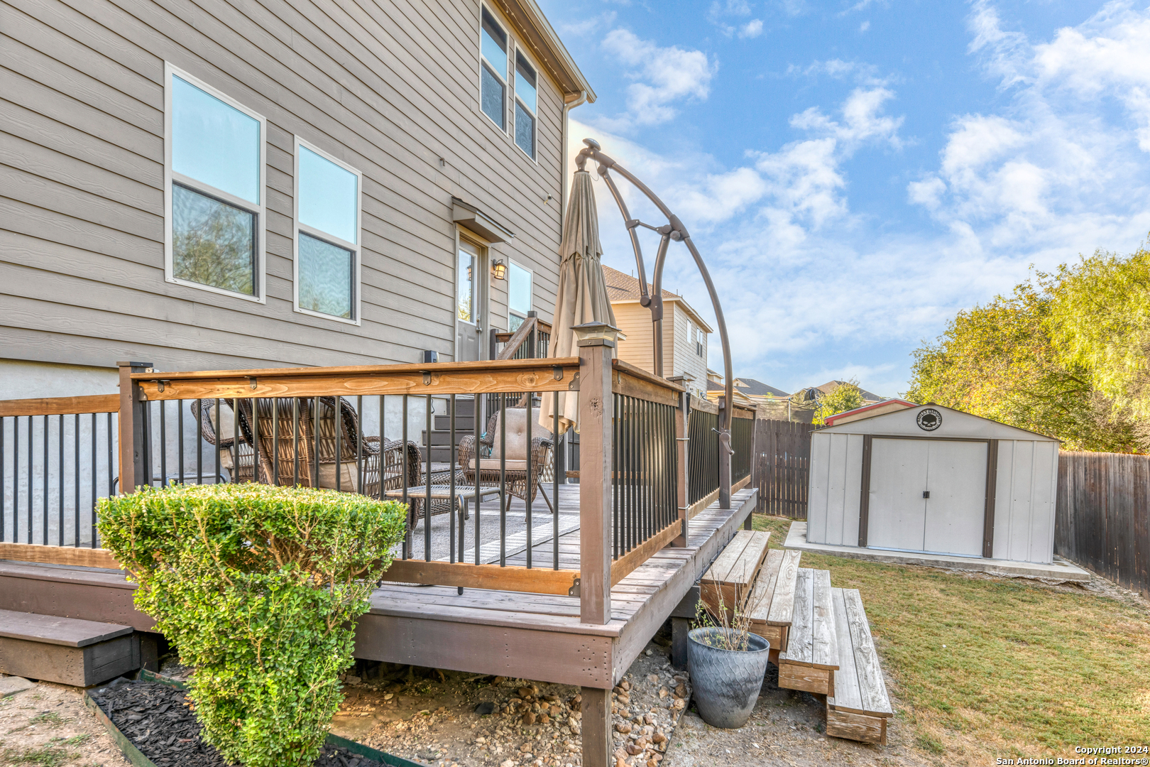 511 Fort Apache San Antonio, TX 78245 - Photo 31 of 32 a view of a chair and table in the balcony