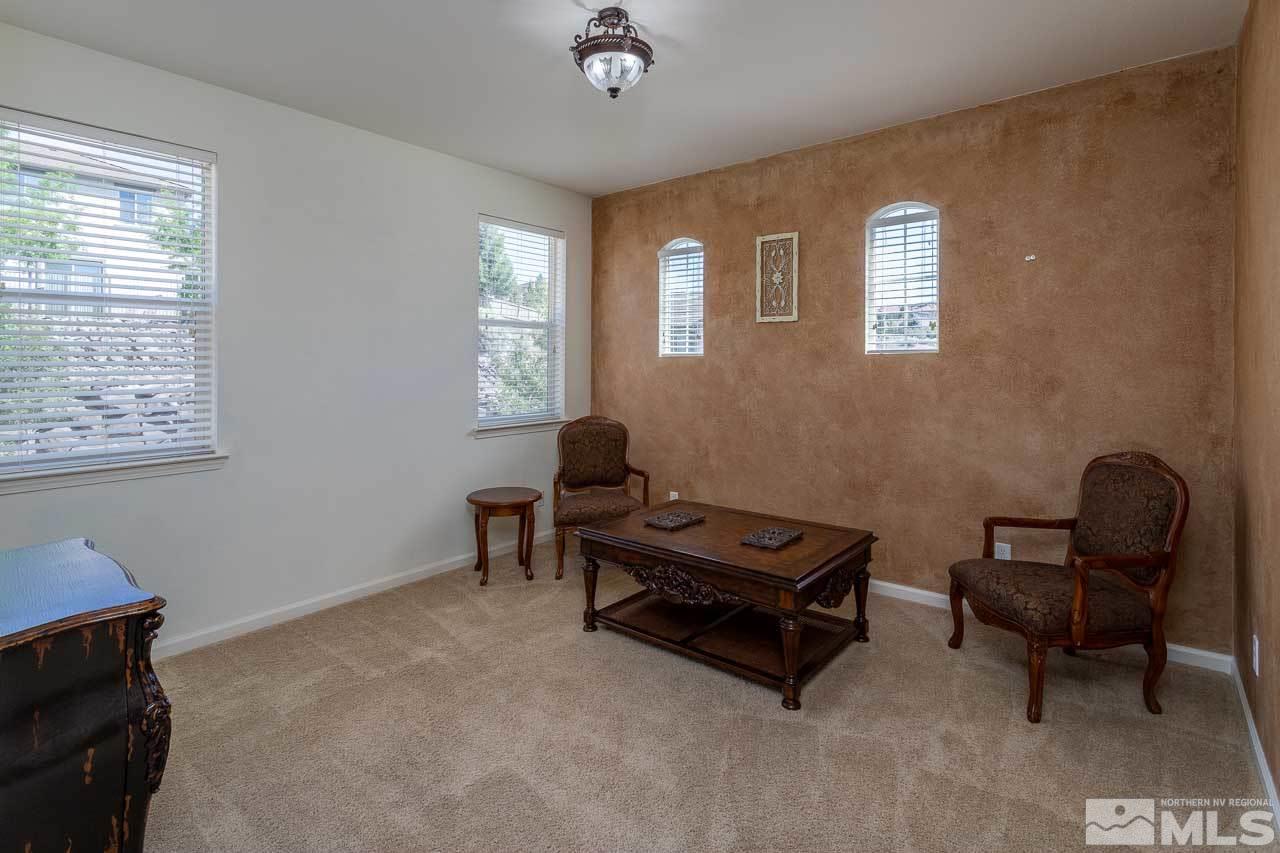 7150 Provence Circle Reno, NV 89523 - Photo 15 of 21 a living room with furniture and a window