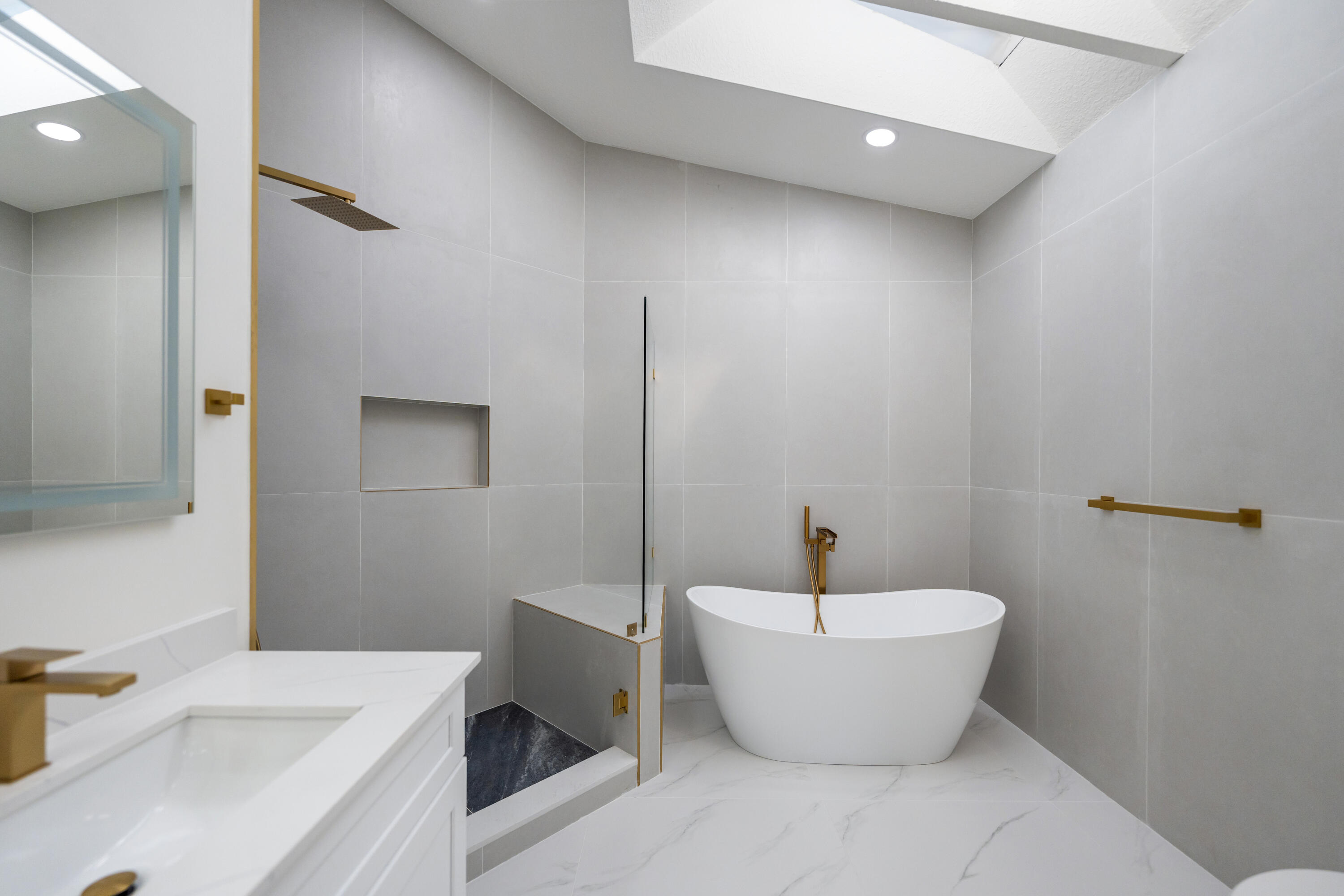 17277 Hampton Boulevard Boca Raton, FL 33496 - Photo 13 of 55 a bathroom with a tub and sink