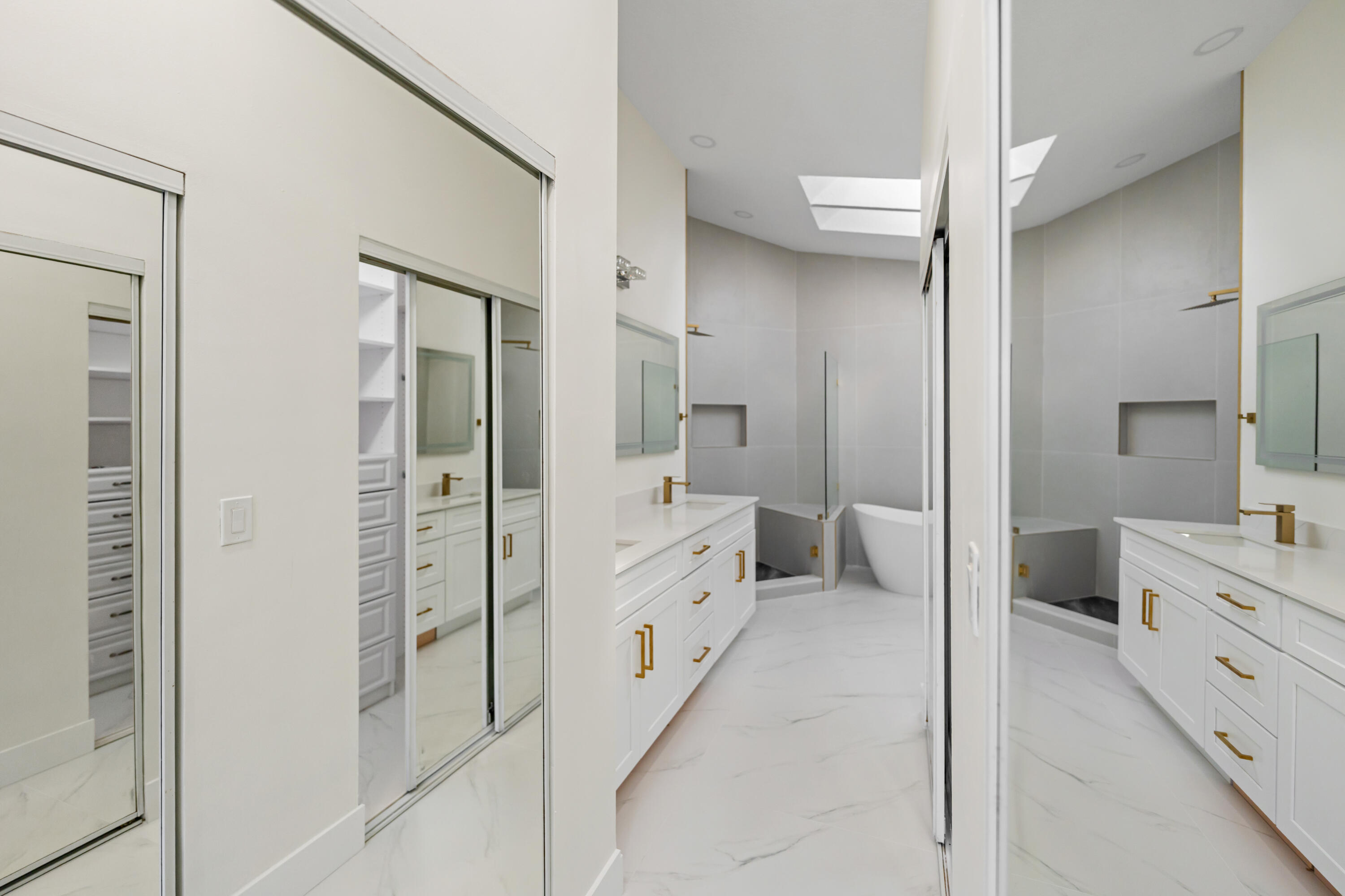 17277 Hampton Boulevard Boca Raton, FL 33496 - Photo 18 of 55 a bathroom with a double vanity sink a toilet and shower