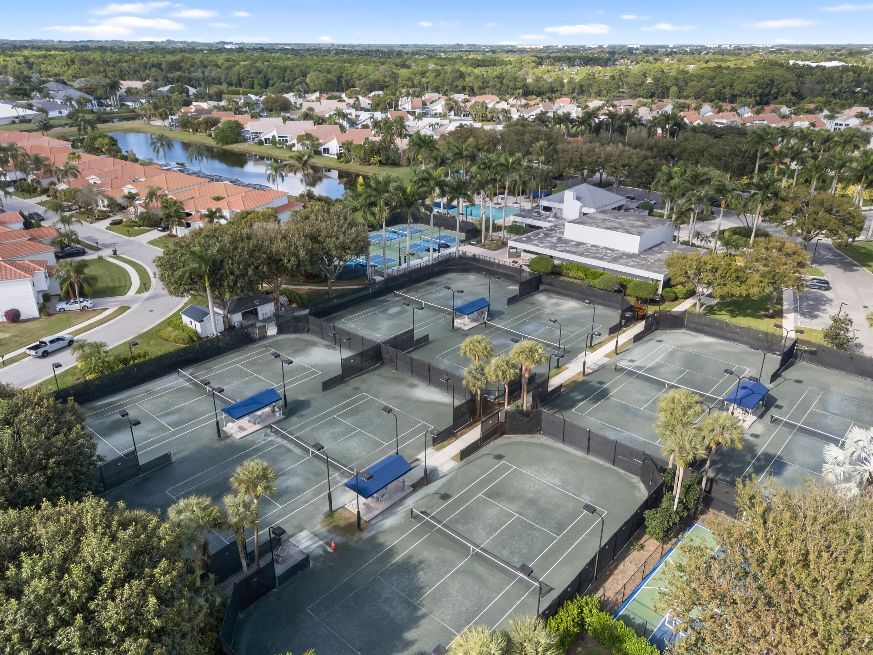 17277 Hampton Boulevard Boca Raton, FL 33496 - Photo 46 of 55 an aerial view of a city with lots of residential buildings