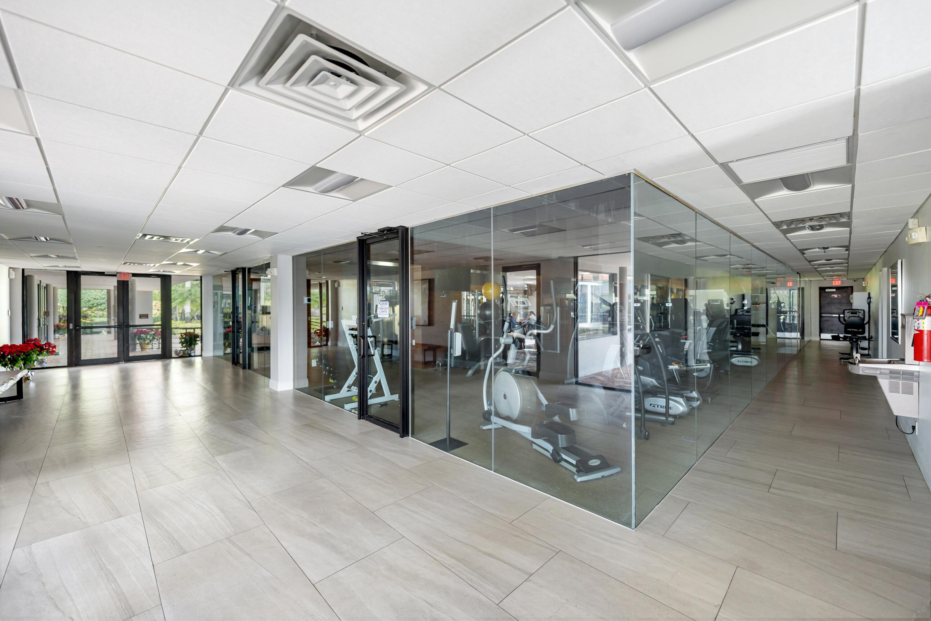 17277 Hampton Boulevard Boca Raton, FL 33496 - Photo 48 of 55 a view of a studio with gym equipment