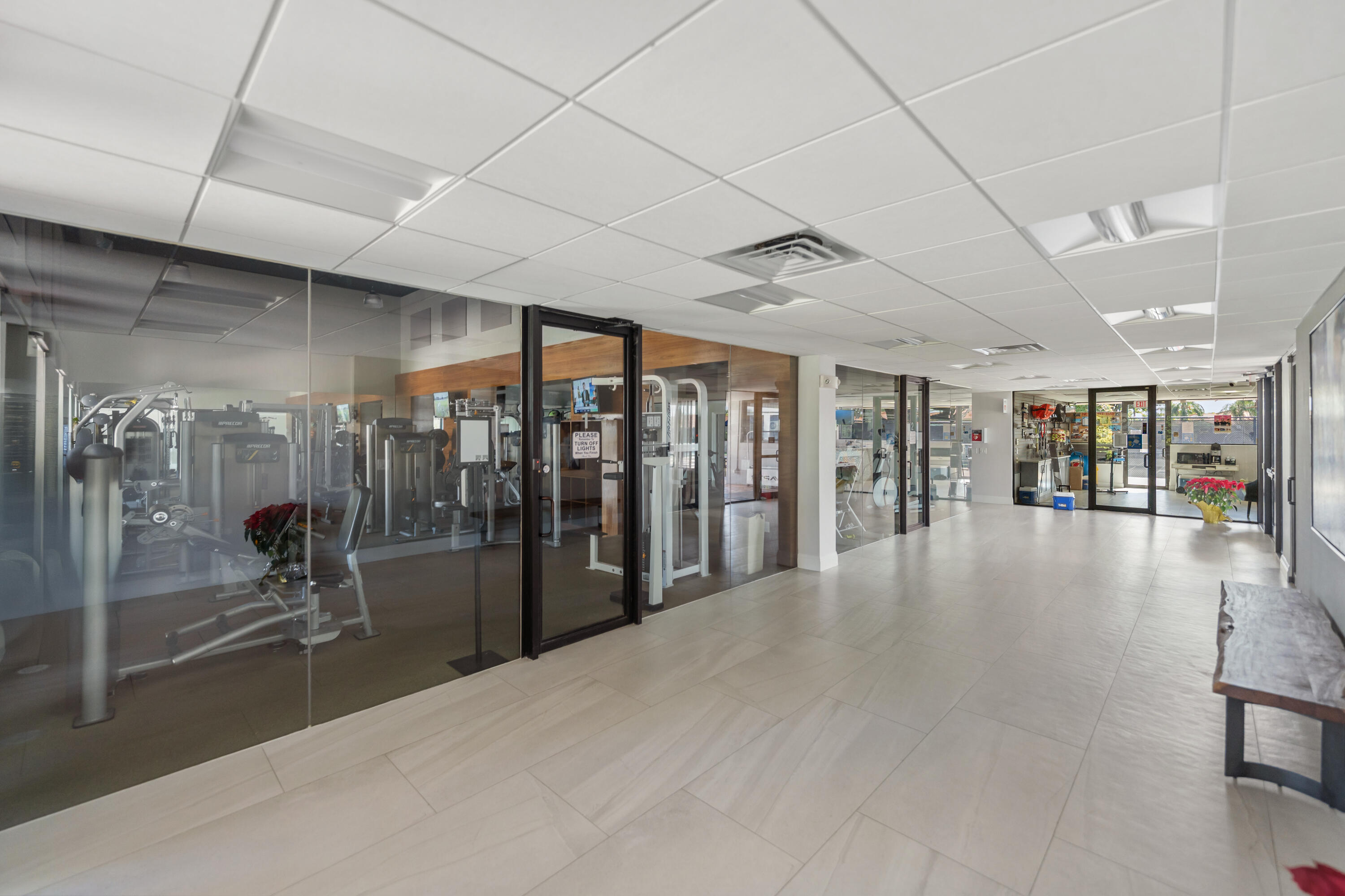 17277 Hampton Boulevard Boca Raton, FL 33496 - Photo 49 of 55 a view of a hallway with wooden floor